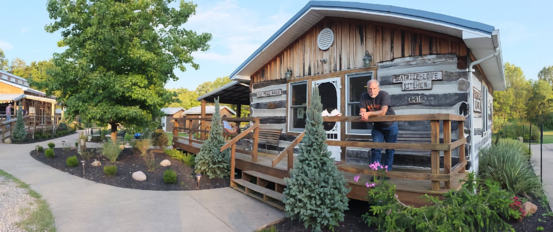 Jorma on the porch at the Fur Peace Ranch kitchen in 2010. This picture appeared in Acoustic Guitar magazine. (Credit: Dennis E. Powell)