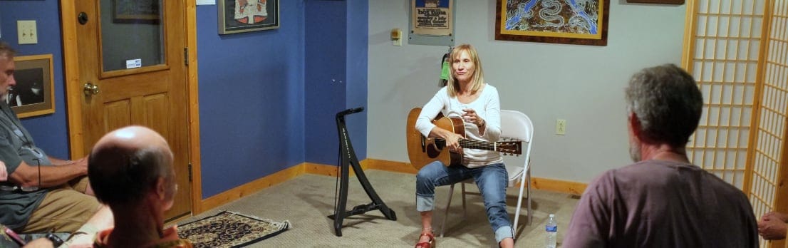 Marjorie Thompson performs for students at the Fur Peace Ranch guitar camp 10 years ago. (Credit: Dennis E. Powell)